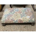 Floral upholstered footstool