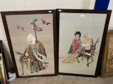 Pair of Chinese silk needlework pictures religious figures set in hardwood frames, 84cm high