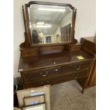 Edwardian mahogany dressing chest with mirrored back