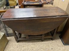 18th Century oval oak drop leaf dining table on turned legs