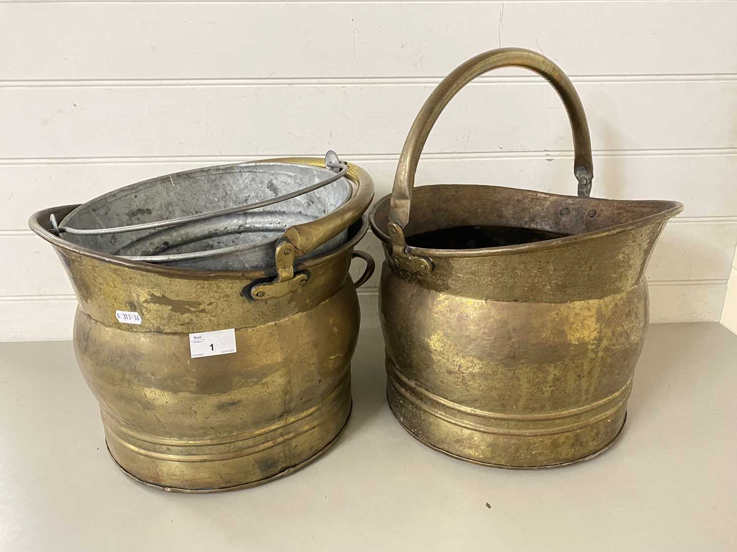 Two brass coal buckets and a galvanised bucket (3)