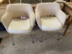 Pair of small armchairs with metal legs