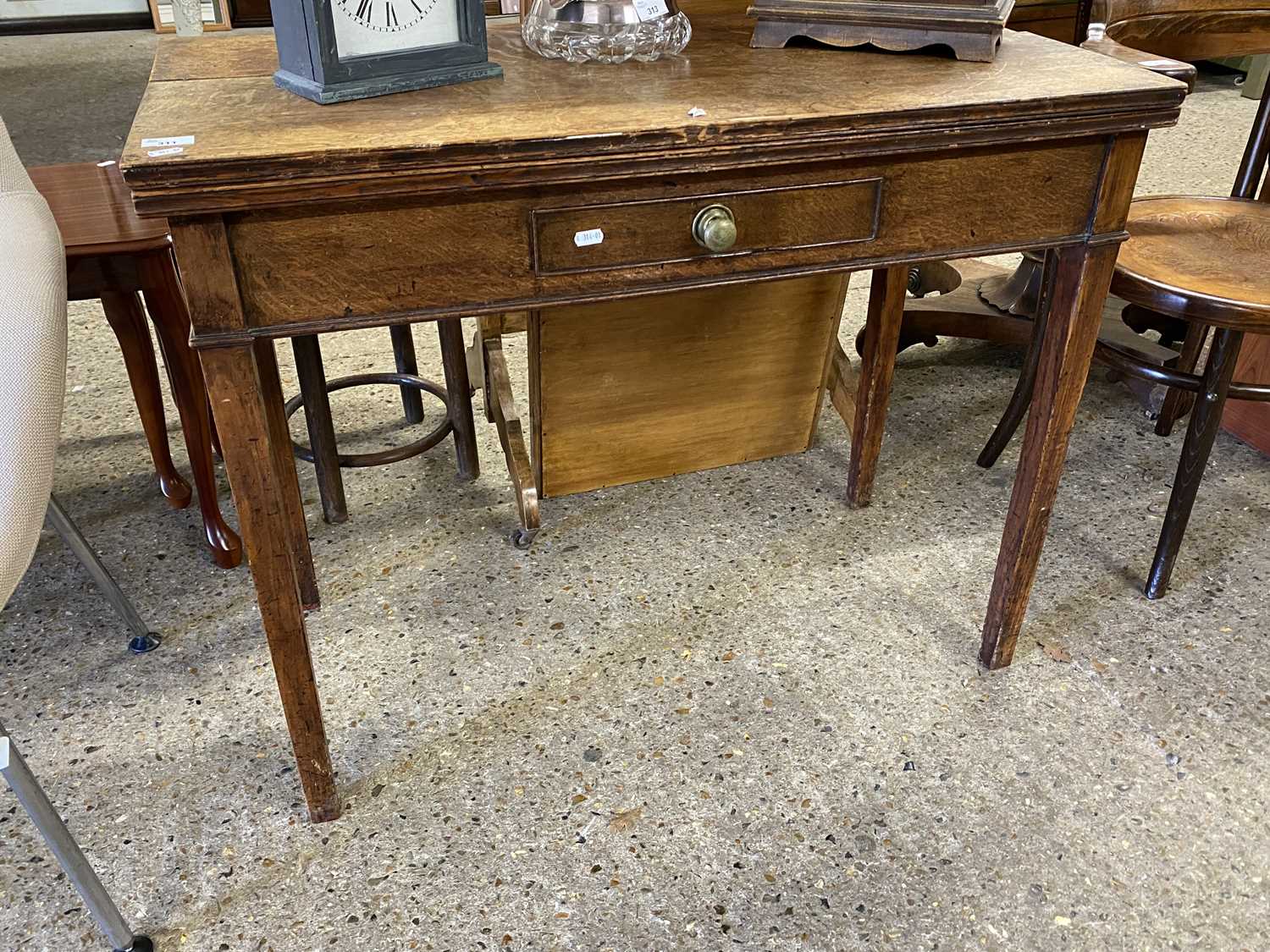 Georgian oak folding tea table with single drawer