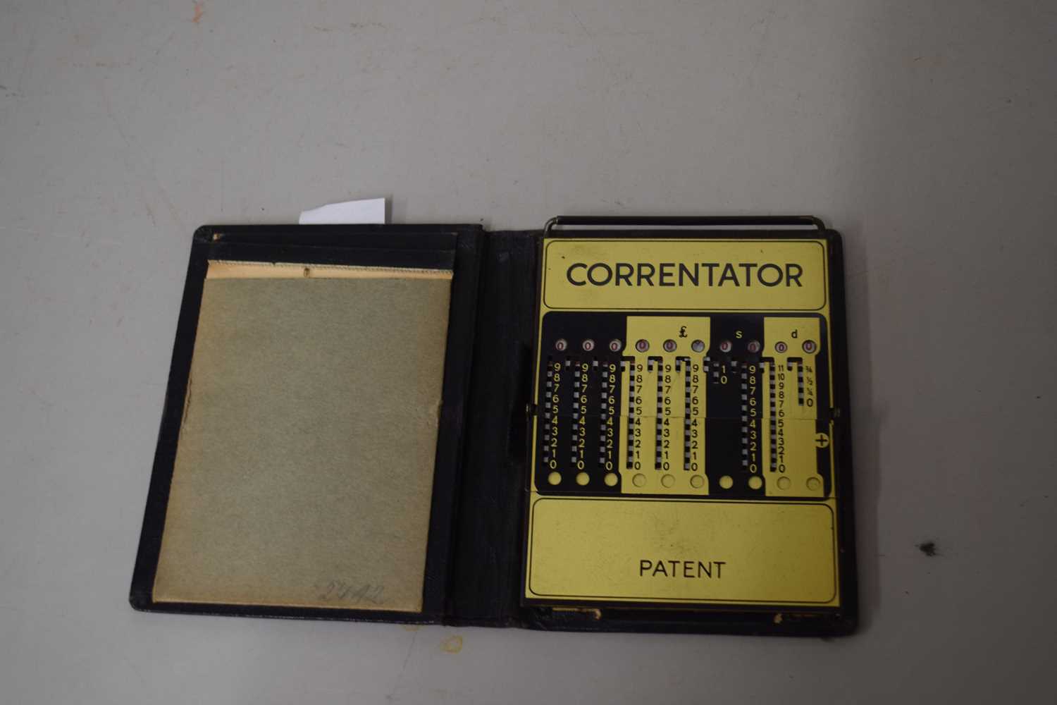 A vintage Correntator Additor calculator