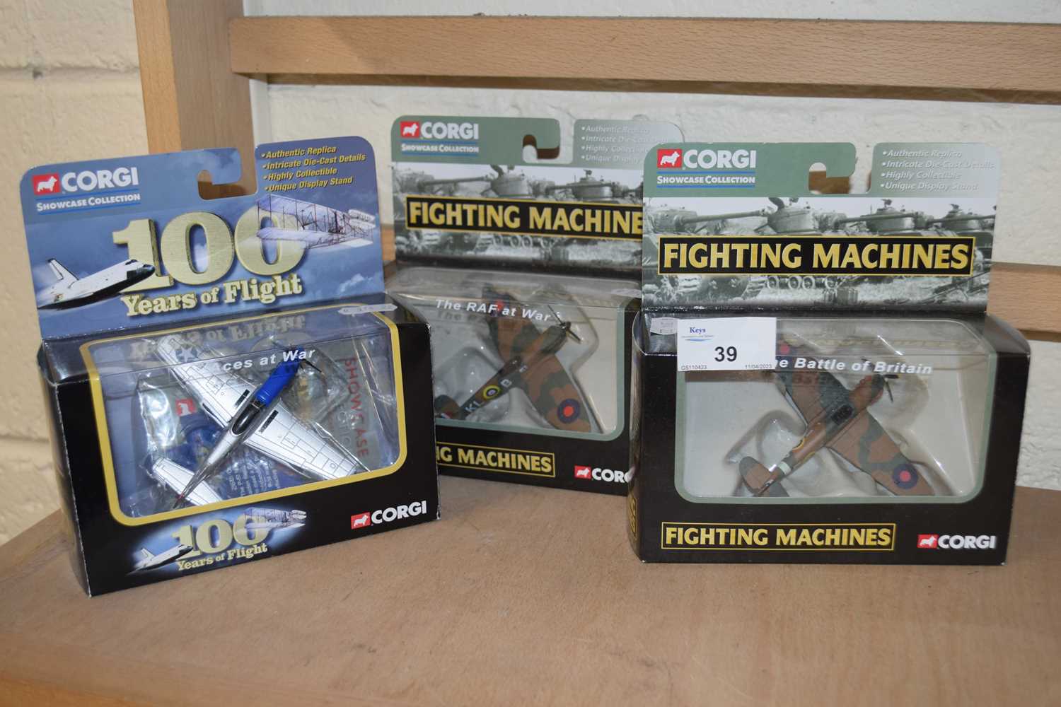 Three boxed Corgi fighter aircraft