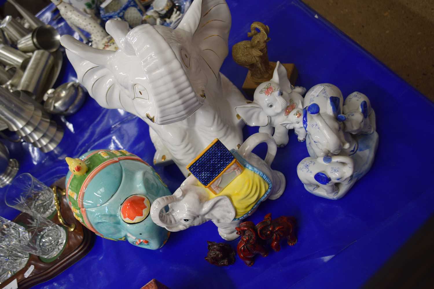 Collection of various assorted elephant models, teapot and biscuit barrel