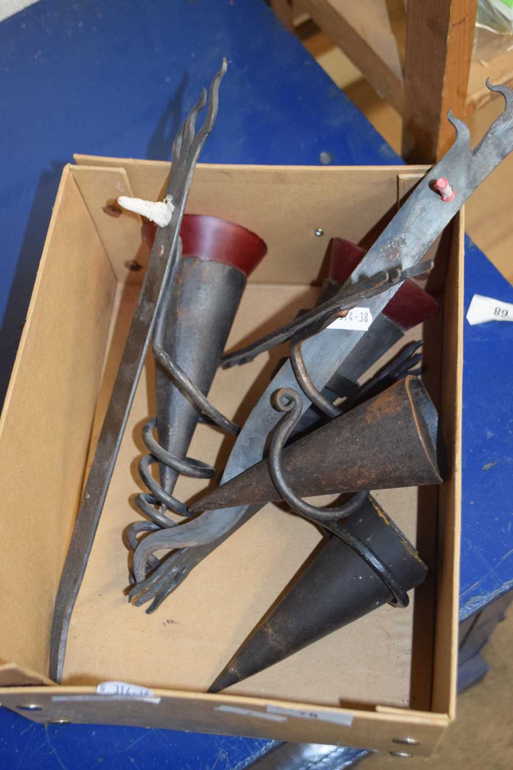 Box of craftsman made iron candle holders