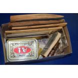 Box of various mixed items to include assorted cigarette and tea cards, vintage tobacco tin, tie