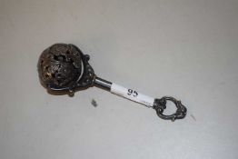 A silver plated babies rattle