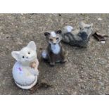 Three small concrete animals