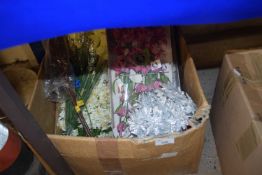 Box of various fake flowers and foliage