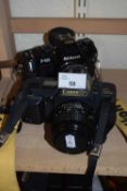 Nikon F-301 camera together with a Canon T70 camera (2)