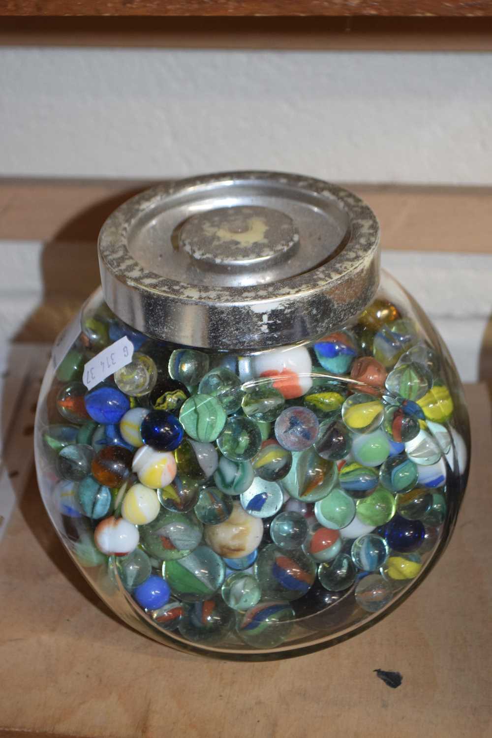 Jar of assorted glass marbles
