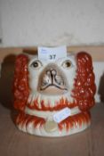 Reproduction Staffordshire vase formed as two Spaniels heads