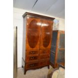 Edwardian mahogany wardrobe with two doors, four dummy drawer fronts and a single base drawer, 207cm