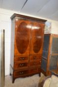 Edwardian mahogany wardrobe with two doors, four dummy drawer fronts and a single base drawer, 207cm