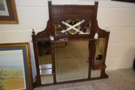 Late 19th Century oak framed over mantel mirror with heart shaped centre detail