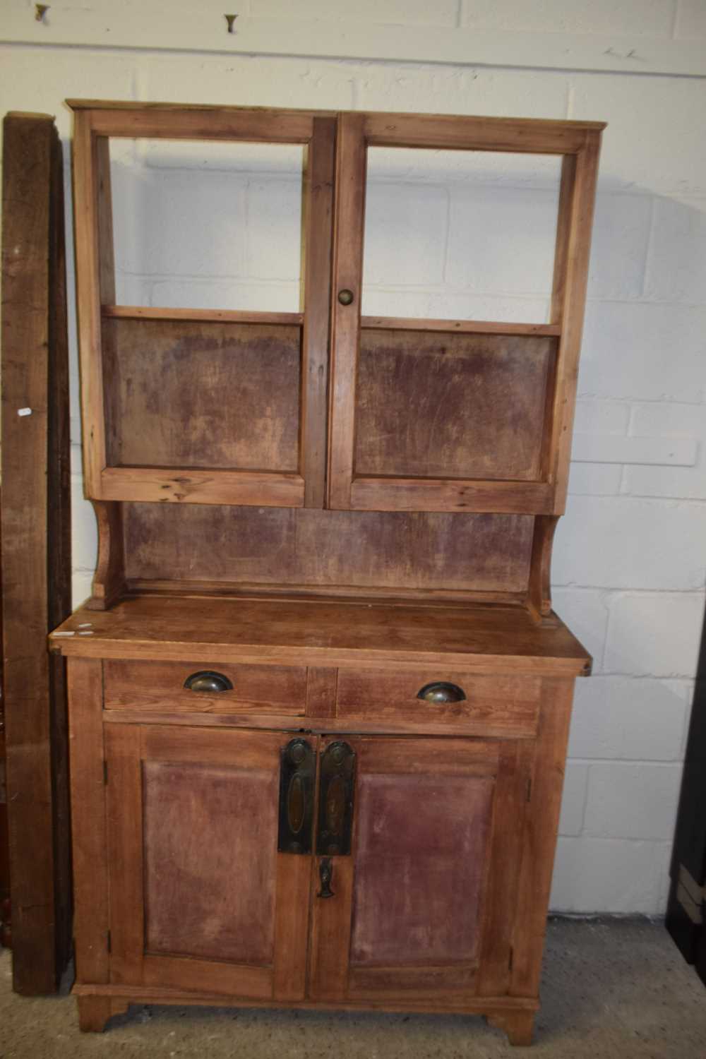 Late 19th or early 20th Century pine kitchen dresser, lacking glass to top, 107cm wide