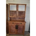 Late 19th or early 20th Century pine kitchen dresser, lacking glass to top, 107cm wide