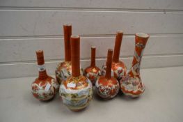 Group of seven similar Japanese onion formed stem vases