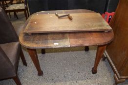 Small early 20th Century oak extending dining table with extra leaf