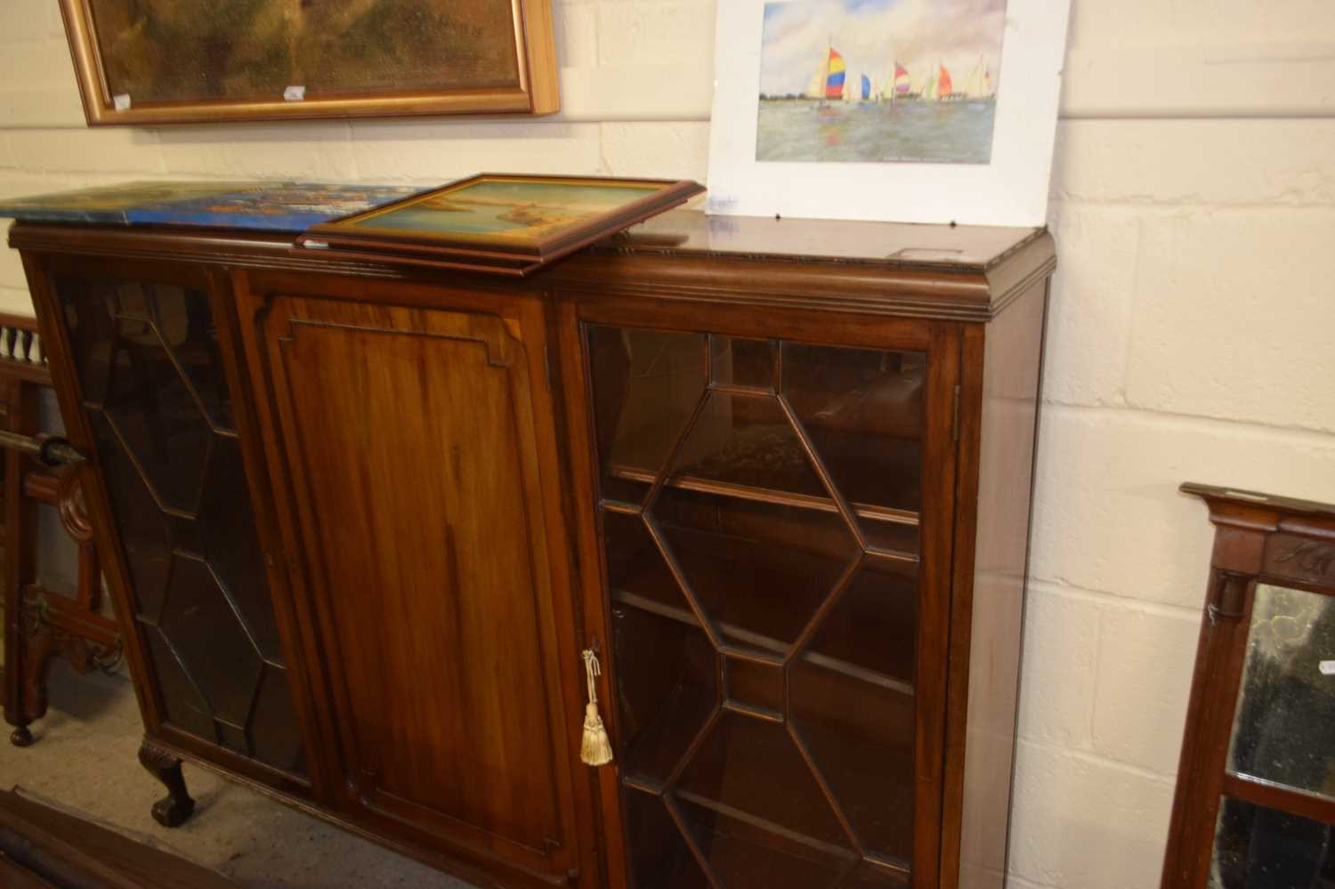 Edwardian mahogany bookcase cabinet on ball and claw feet