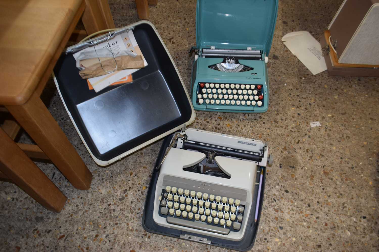 Two vintage portable typewriters