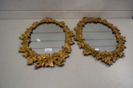 Pair of oval wall mirrors set in metal ivy leaf decorated frames, 46cm high