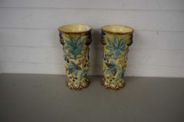 Pair of Maiolica style double handled vases with leaf and mask decoration (a/f)