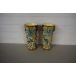 Pair of Maiolica style double handled vases with leaf and mask decoration (a/f)