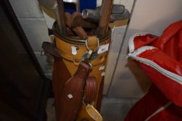 Case of vintage golf clubs