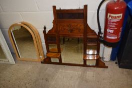 Late Victorian American walnut over mantel mirror with carved floral decoration
