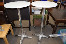 Pair of metal based bar tables