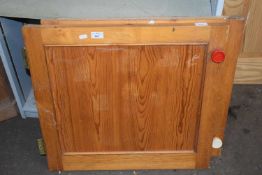 A pair of pine cabinet doors