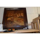 An inlaid wooden picture of elephants in a landscape