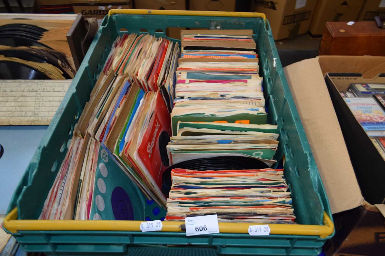 Large box of assorted singles