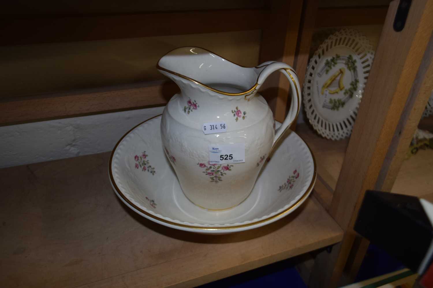 Minton wash bowl and jug decorated with pink flowers and gilt decoration