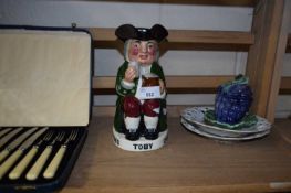 Mixed Lot: Charringtons toby jug together with Cromer ribbon plates and a further small grape shaped
