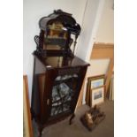 Edwardian glazed cabinet with velvet lined shelves and mirrored back