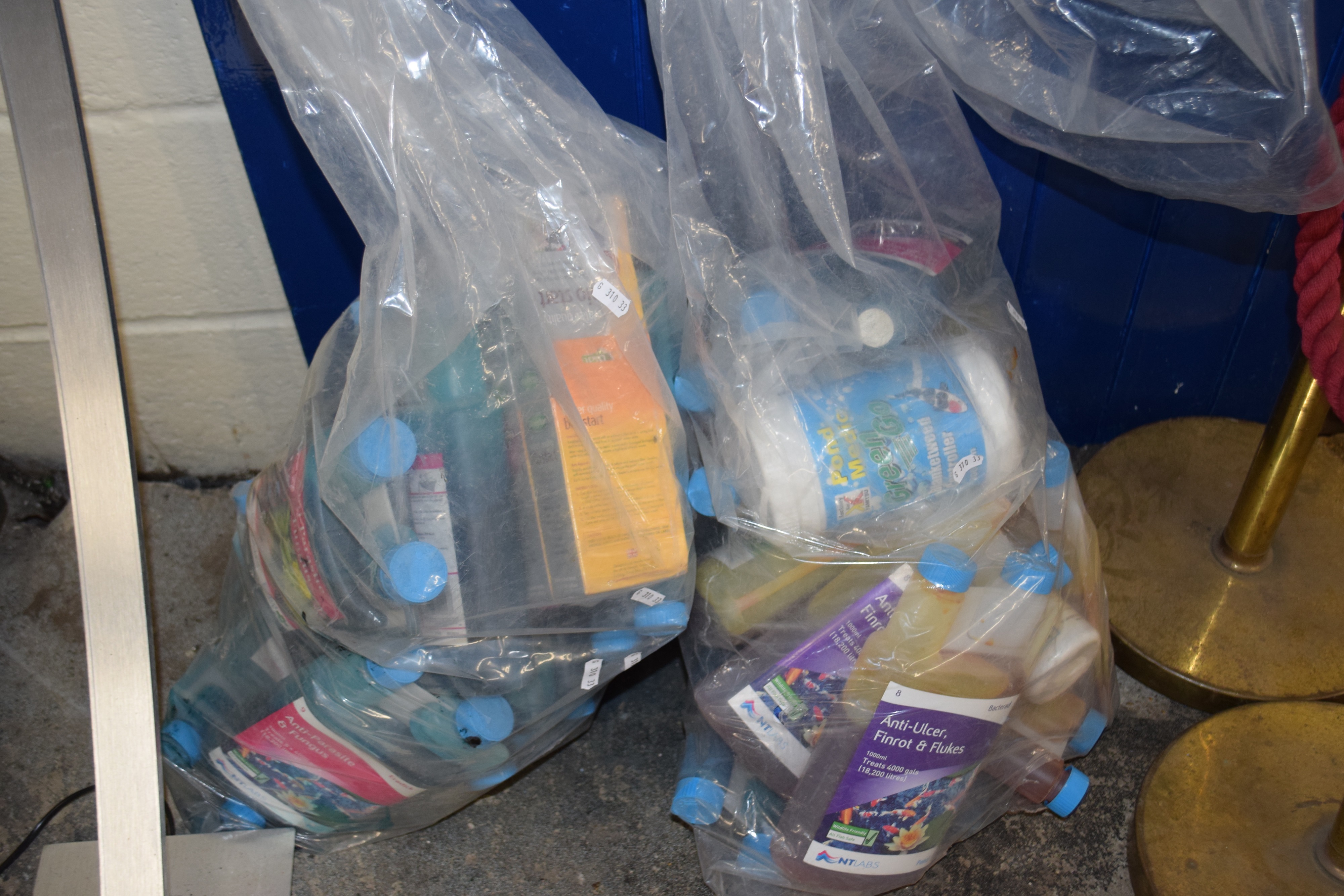 Two bags of various pond feeds and chemicals - Image 2 of 2