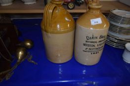 Two stone ware flagons, one by Dakin Bros
