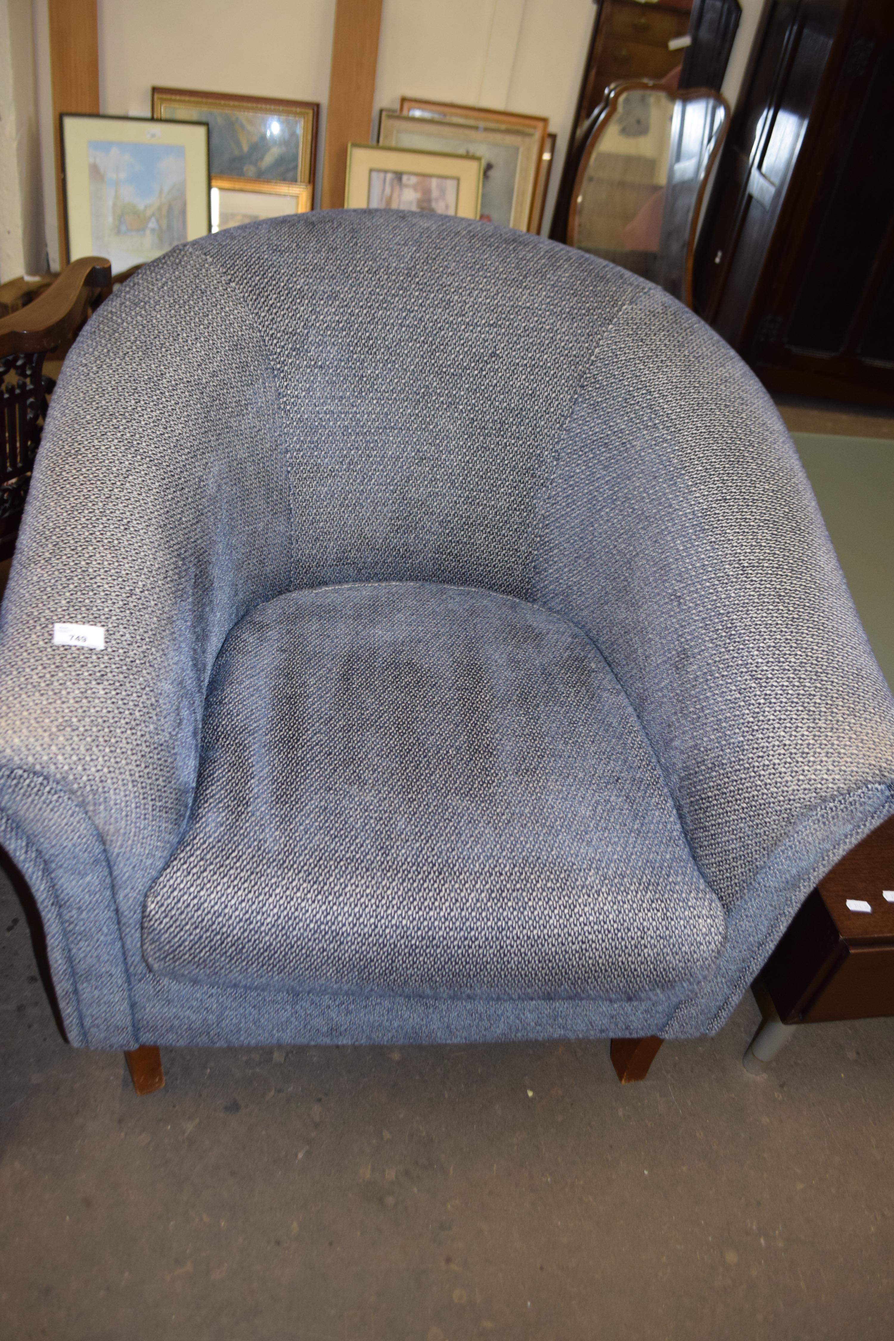 Blue upholstered tub chair