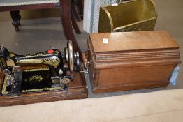 Vintage Singer sewing machine in wooden case