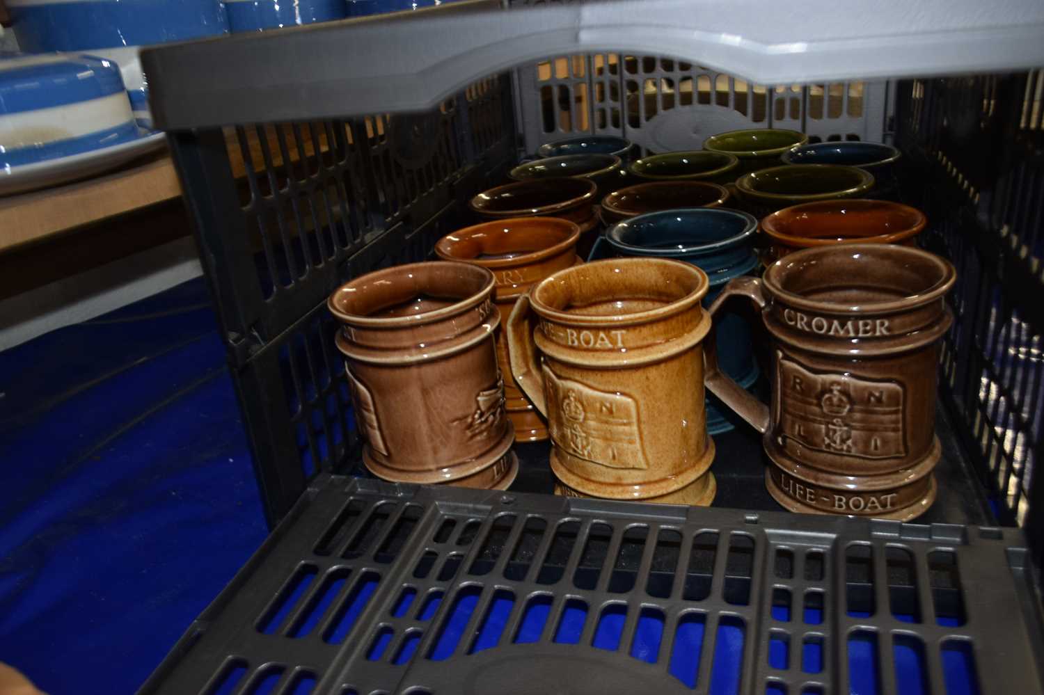 Fourteen RNLI Cromer Lifeboat pottery mugs