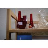 Small quantity of red glass vases