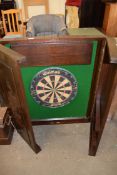 Winmau dart board set in a Chinese hardwood case with carved dragon detail, 81cm wide