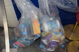 Two bags of various pond feeds and chemicals