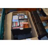 Box of assorted music cassettes, some cased