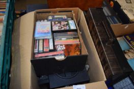 Box of assorted music cassettes, some cased