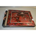 Japanese lacquered photograph album with integral musical movement, no photographs within